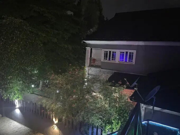 Front of property - evening/night, A Luxury Apartment, Bwari