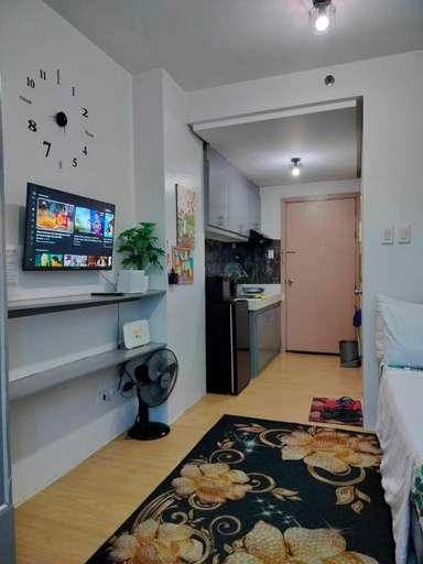 Shared lounge/TV area 5, Cozy City View Condo in Quezon City - Your Home Away from Home, Quezon City