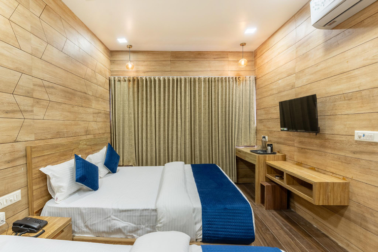Bedroom 3, Hotel Noble Inn, Ahmadabad