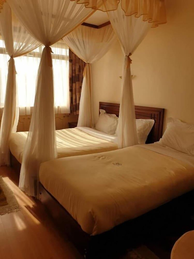 Bedroom 2, Maxoil Hotel, Kieni