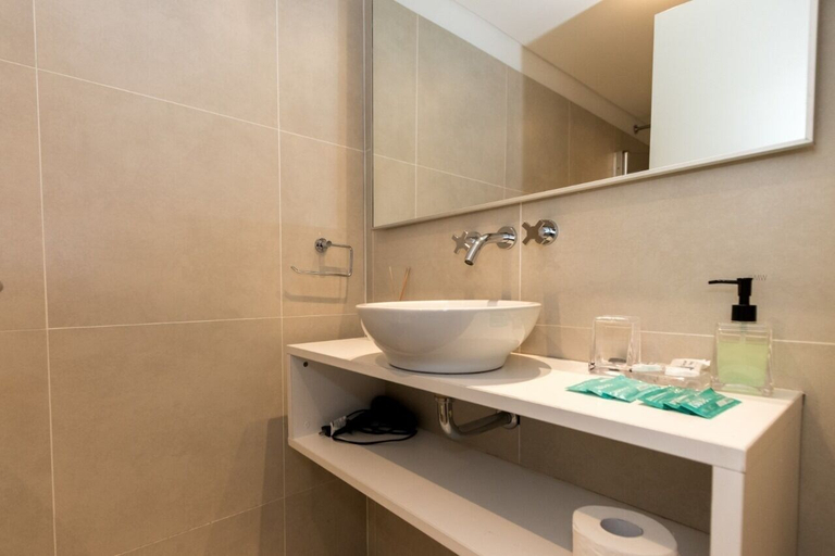 Bathroom, Austral Apartamentos by Pacifico Apart, Ushuaia