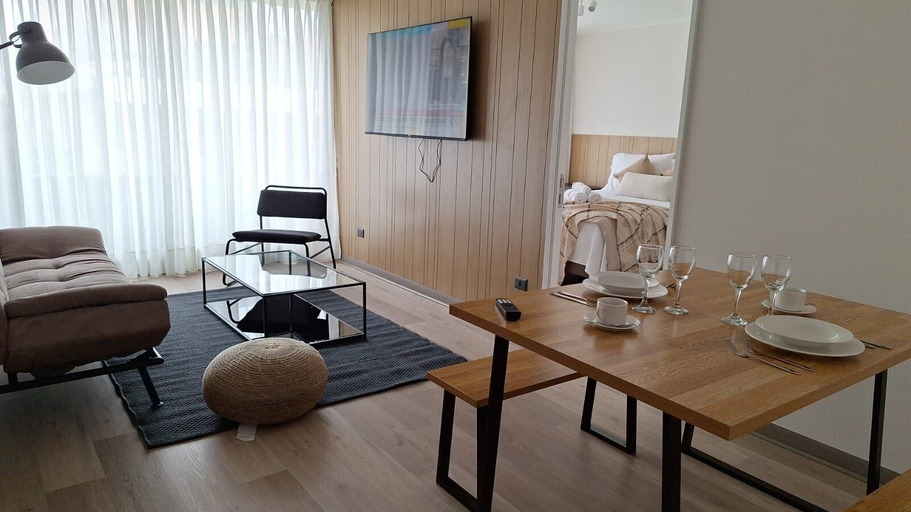 Living area 2, NM Departamentos Amoblados, Concepción