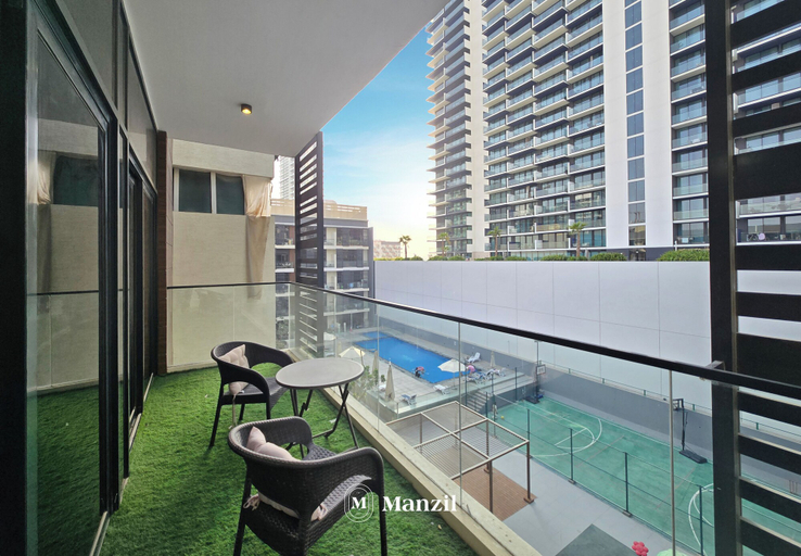 Balcony, Manzil-Stylish 1BR with Maid room in JVC, Dubai