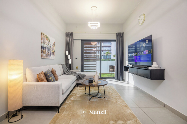 Living area 5, Manzil-Stylish 1BR with Maid room in JVC, Dubai