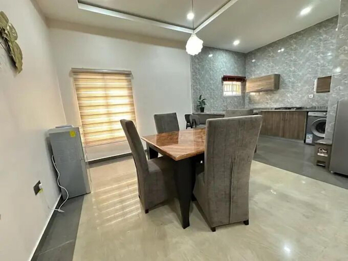 Family dining, Infinity Luxury Apartment, Bwari