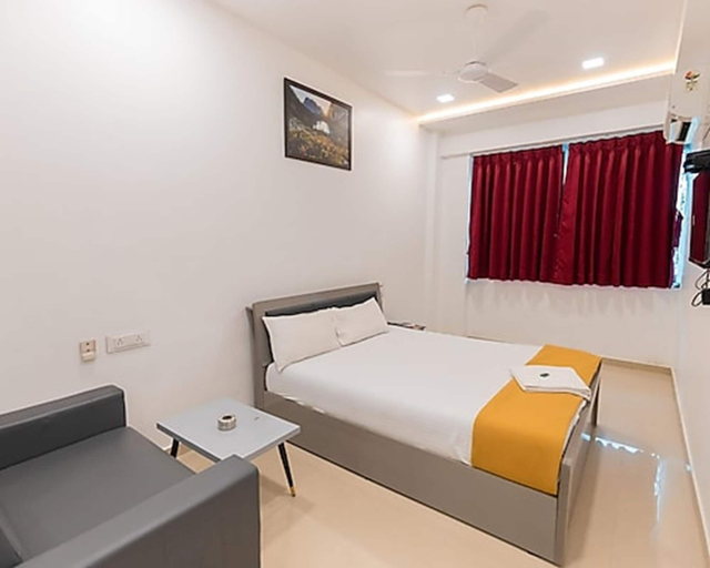 Room 2, Hotel Nirali Rooms - Nexus Hospitality, Surat