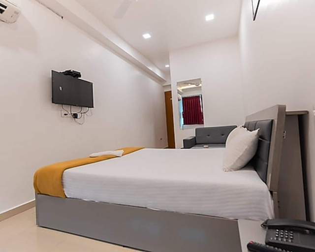 Room 5, Hotel Nirali Rooms - Nexus Hospitality, Surat