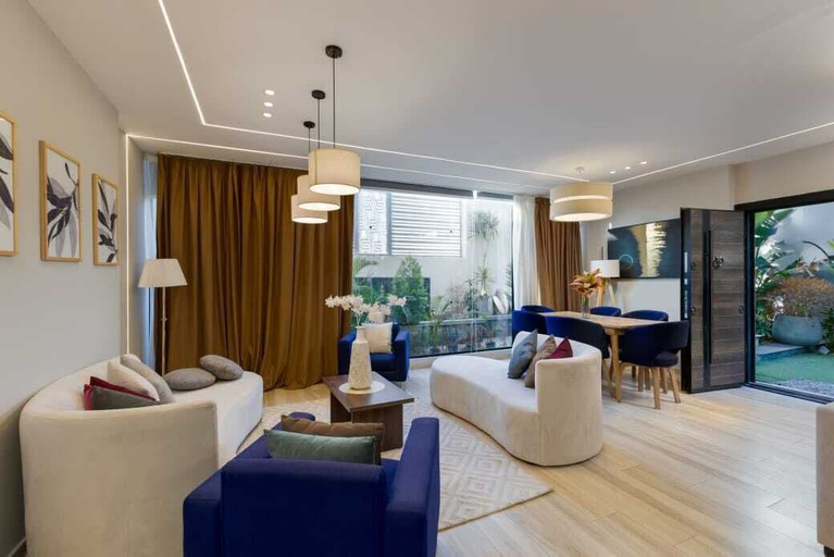 Living area 5, ALSAWAH Spacious Garden Apartment in 9th District Sheikh Zayed, Sheikh Zayed