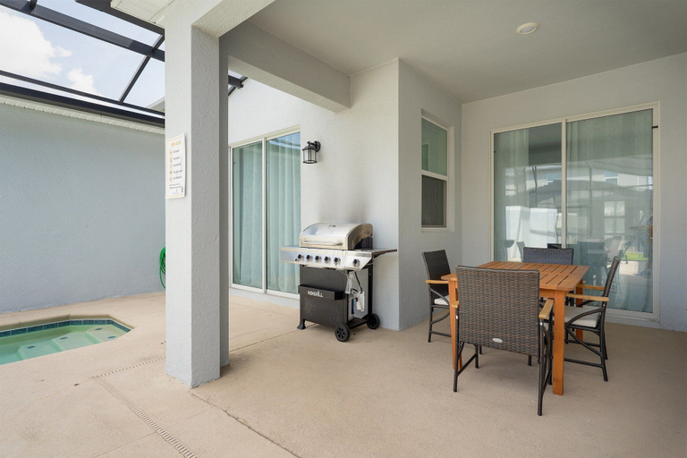 Outdoor dining 2, Storey Lake Resort 4BR Home w/ Private Pool, Osceola