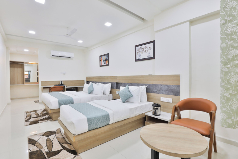 Bedroom 2, Hotel SR Radhey, Surat