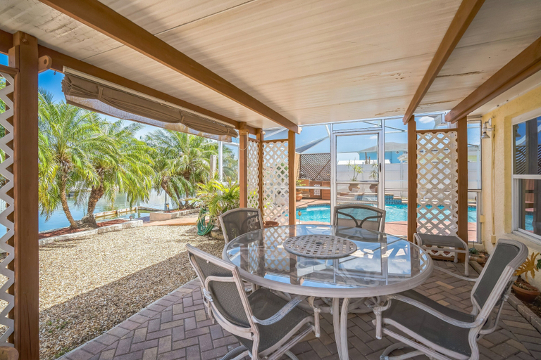 Outdoor dining 5, Waterfront Escape With Private Pool & Gulf Access 3 Bedroom Home, Pasco