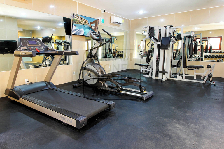 Gym 2, Fully remodeled two-bedroom ocean view condo at ELFARO by DPM, Cozumel