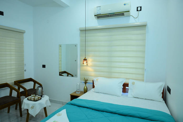 Room 4, Hotel Elroi Suites, Ernakulam