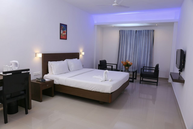 Bedroom 5, Finch Hotels, Kottayam