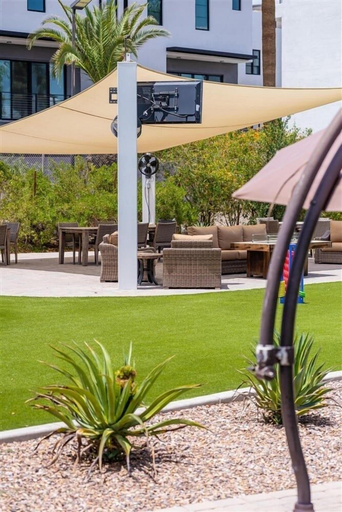 Outdoor dining 2, 132 Fully Furnished, amenities galore! by RedAwning, Maricopa