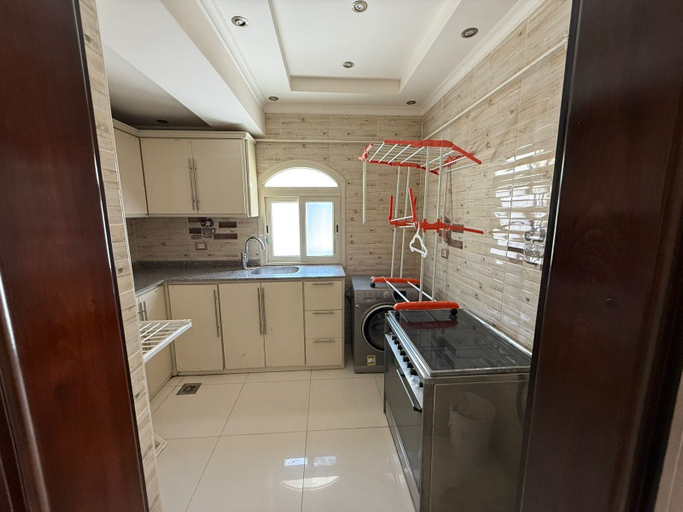 Private kitchen, ALSAWAH Elite 5BR Retreat with Private Pool in Green Heights, Sixth of October 1 City