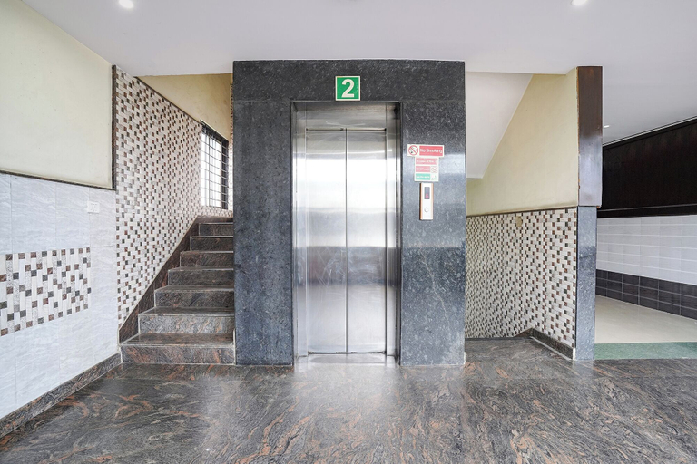 Elevator 5, Fabhotel Millennium Suites, Bangalore