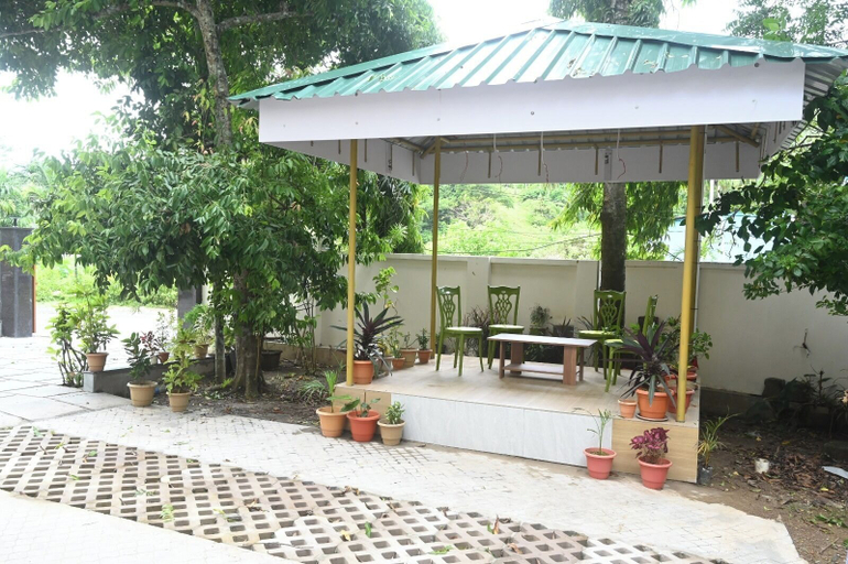 Garden view, Aashirvaad Bed And Breakfast Homestay, South Andaman