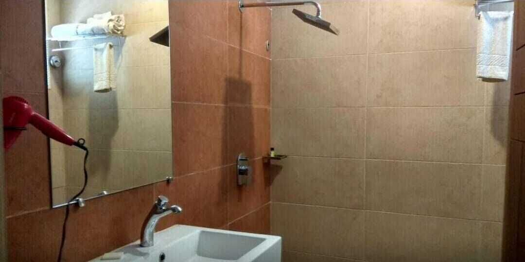 Bathroom 3, Hotel Thanmayi Inter National, Krishna