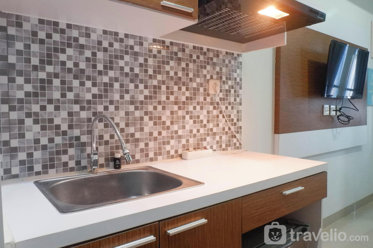 Private kitchen, Scenic Modern Studio Room At Tamansari Papilio Apartment, Surabaya