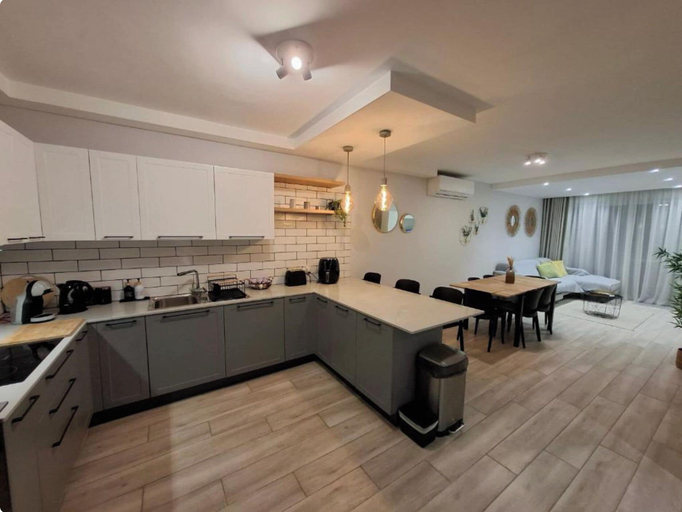 Private kitchen 3, Modern 3BR Apt With Large Balcony
