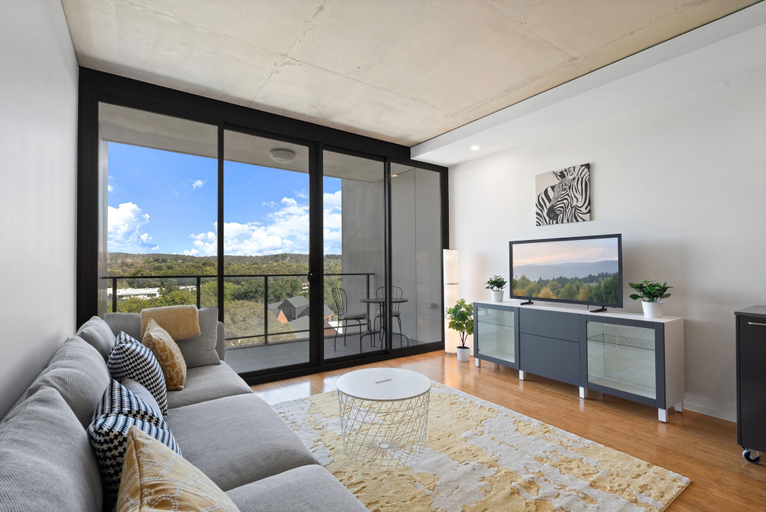 Separate living room 5, Chic 1-Bed Apartment Near Canberras Bustling CBD, Canberra