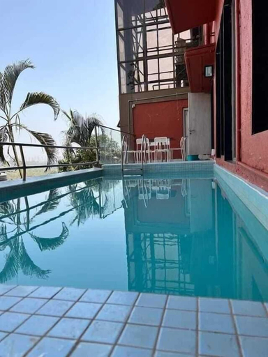 Indoor/outdoor pool, Lazy Moose Villa, Mumbai Suburban