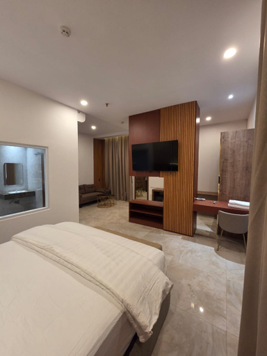 Comforta Suites Hotel - Tap to explore photos