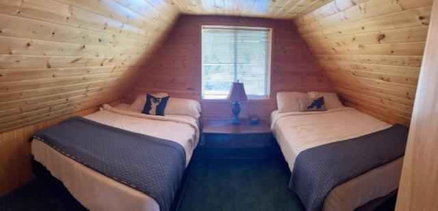 Exterior view 2, Totem Pole Lodge, Kane