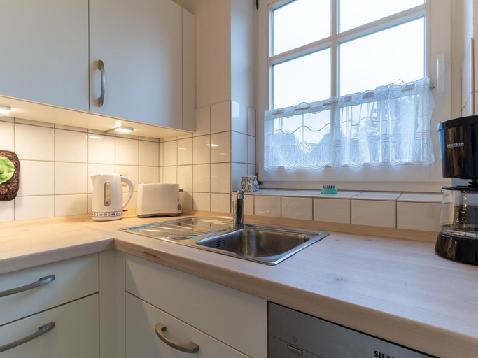 Others 2, Apartment mit Kamin in einer Eigentumswohnung, Nordfriesland