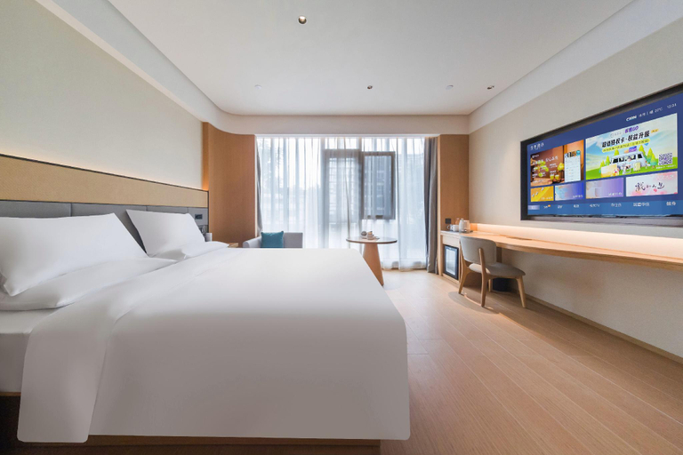Bedroom 2, Ji Hotel Qionghai Wanquan River Renmin Road, Hainan