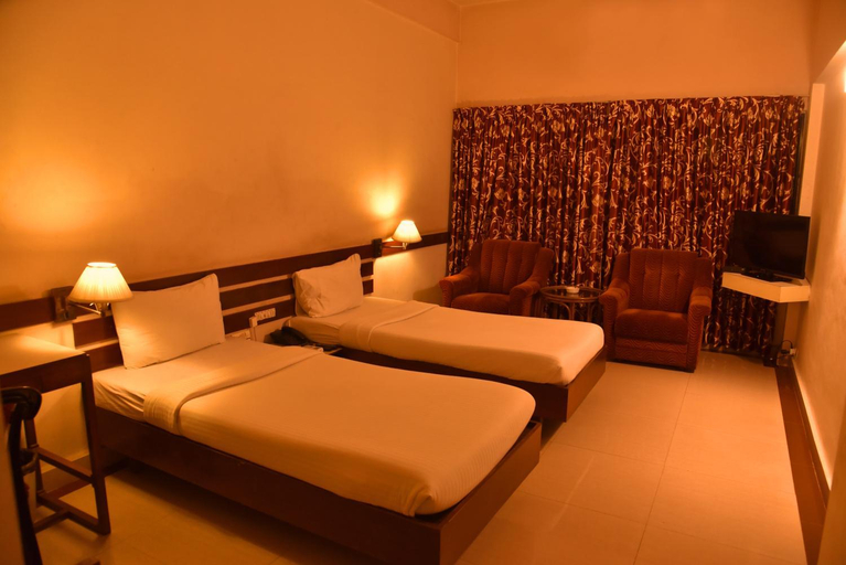 Bedroom 2, Hotel Poonja International, Dakshina Kannada