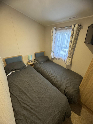 Bedroom 2, J2 static caravan at Fairway Holiday Park, Isle of Wight