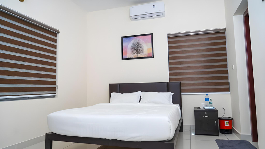 Bedroom 3, Atmos Inn, Kozhikode