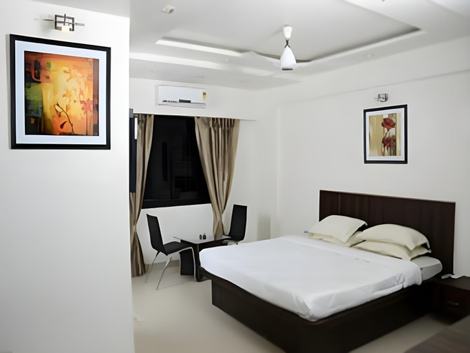 Bedroom 2, Suresh Inn, Pune