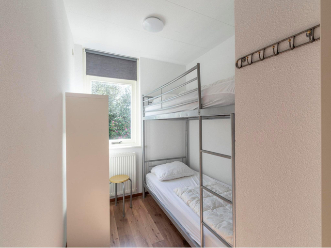 Bedroom 2, Bungalow with Sauna and Pool in Quiet Location, Zijpe