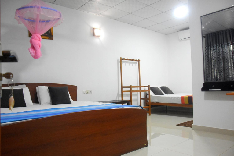 Bedroom 2, CFC Holiday Home, N. Palatha East