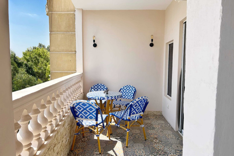 Outdoor dining 5, Xuru Stays I Spellbinding 2 BDR Apt. At The Giza Pyramid's Doorstep, Al-Ahram