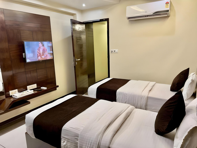 Bedroom 3, HOTEL REST INN, Surat