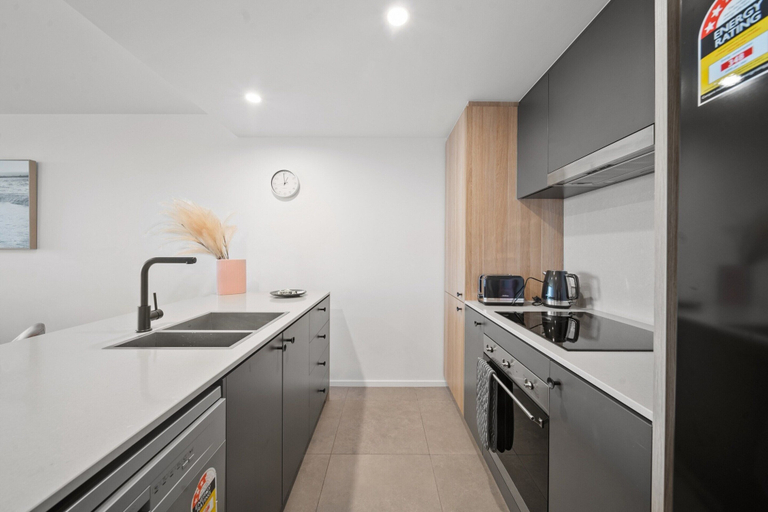 Private kitchen 4, Sleek 2-bed Apartment With Rooftop Garden Access, Canberra