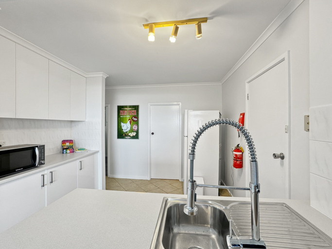 Private kitchen 4, Oceanfront 4-bed Haven With BBQ & Alfresco Dining, Eurobodalla