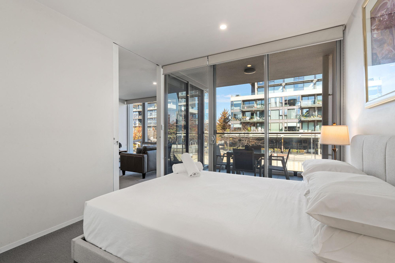 Bedroom 5, Spacious Lakefront Apartment with Pool Access, Canberra