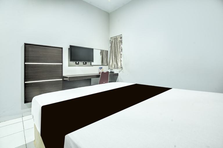 Room 2, Hotel O Makassar near Mall Panakukang formerly Hotel Lucky Inn Makassar, Makassar