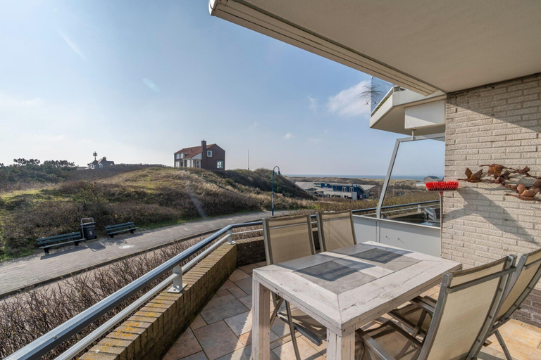 View from property 3, 4-person corner apartment with a beautiful view, Texel