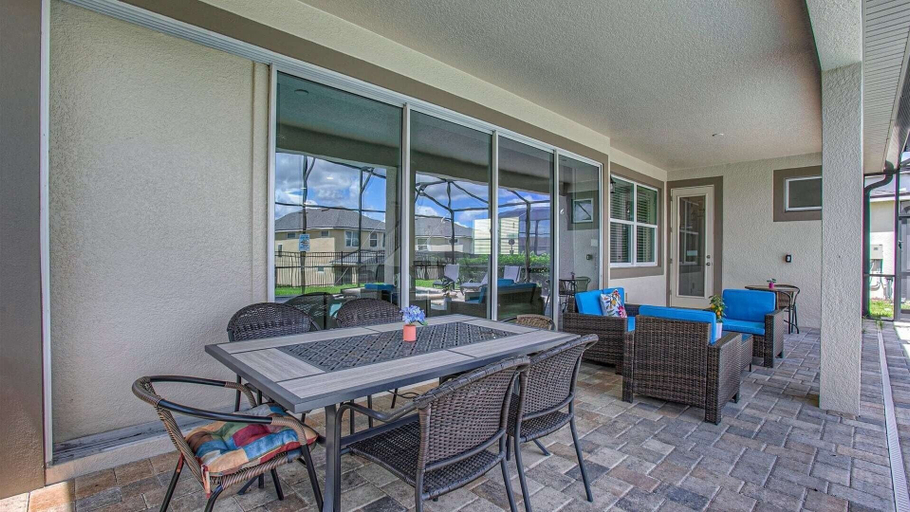 Outdoor dining 5, Solara Resort 9 Bedroom Private Pool Home 9 Home, Osceola