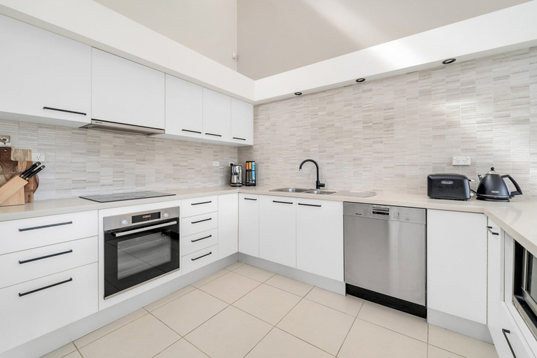 Private kitchen 2, 3-bed With Beach Views and Entertainment Area, Eurobodalla