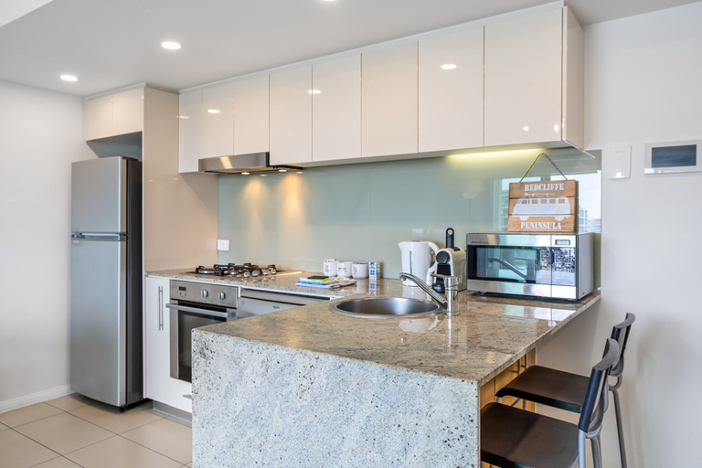 Private kitchen 5, Feel The Sea Breeze: 1-bed With Pool, Gym & Views, Redcliffe-Scarborough