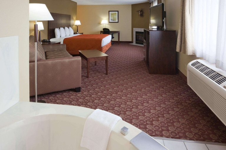 Bedroom 3, AmericInn by Wyndham Blue Earth, Faribault