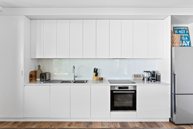Private kitchen, Ocean Views, Deck and Parking at Beach Apartment, Sydney