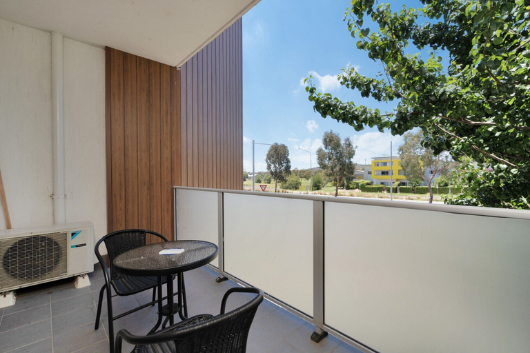Outdoor dining, Elegant 2-bed Apartment With Balcony, Canberra